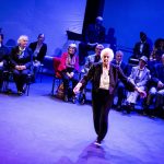 Elderly people dancing on stage
